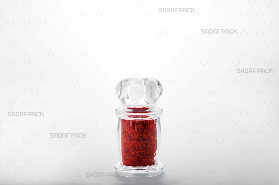 A premium Milad 2 crystal container filled with high-quality saffron, demonstrating its ideal use for luxury export products.