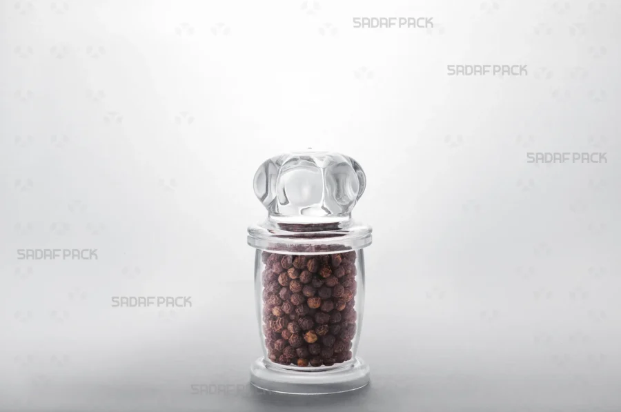 A three-quarter view of the Milad 3 container filled with Black Peppercorns, demonstrating its suitability for export-quality food products. 