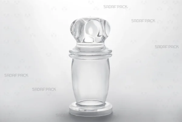 Three-quarter angle view of the Milad 4 crystal container by Sadaf Pack, showcasing its clear, high-quality polycrystal structure.