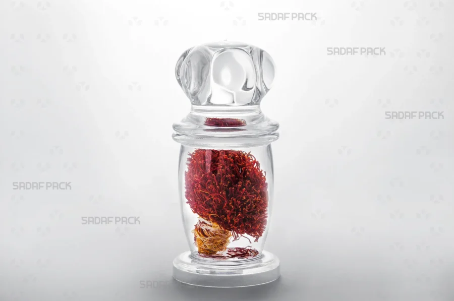 A Milad 4 crystal container filled with saffron, demonstrating its suitability for exporting high-value food products.