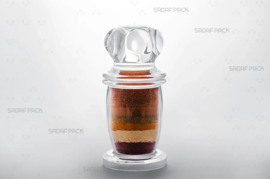 A Milad 4 crystal container filled with seven spice blend, demonstrating its suitability for exporting high-value food products.