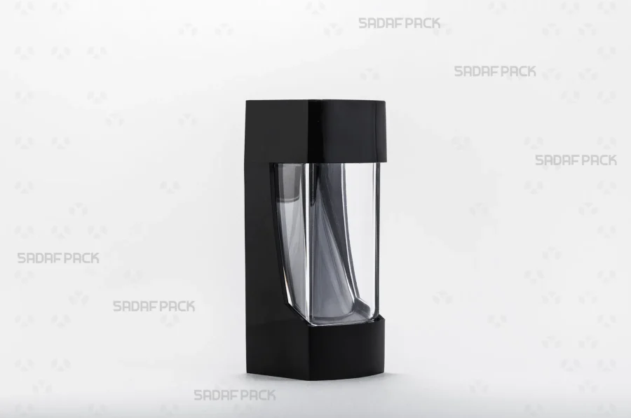 Three-quarter angle view of the elegant Negin Black crystal container for saffron, showcasing its sleek design by Sadaf Pack.