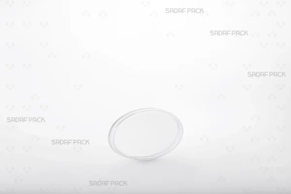 A three-quarter angle view of the Oval 4 Crystal container by Sadaf Pack, showcasing its elegant elliptical design for premium saffron packaging.