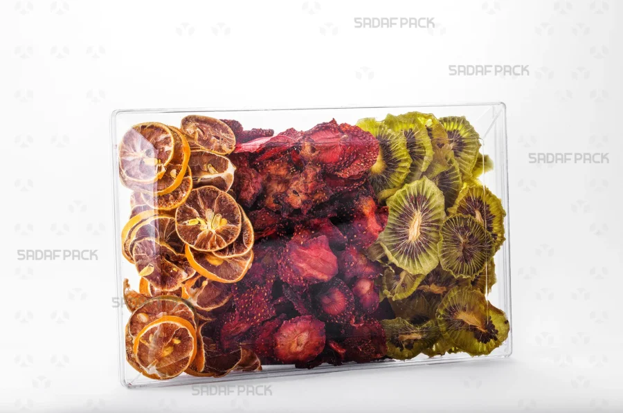 The Rectangle 200 container filled with dried fruits, showcasing its excellent clarity for premium product presentation suitable for export.