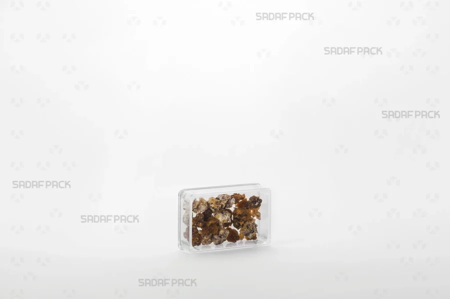 An elegant display of the 4 Deep Crystal Rectangle container filled with Frankincense, making it a perfect choice for export products.