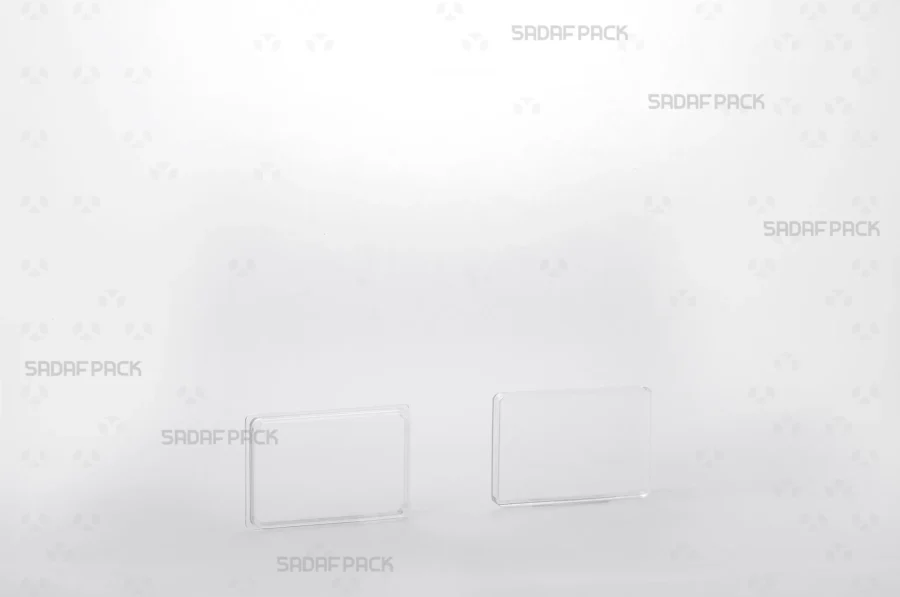 The 4 Slim Crystal Rectangle container displayed with its lid and body separated side-by-side, revealing the interior space suitable for small products.