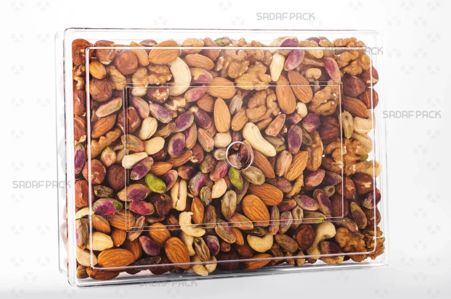A Rectangle 400 container filled with nuts, demonstrating its excellent clarity for luxury food exports. 