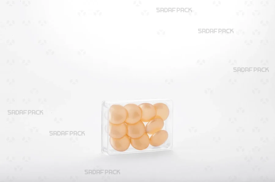 The Rectangle 7 Deep Crystal container filled with high-quality yellow glass Cabochons, demonstrating its ideal capacity and clarity for export-grade saffron.