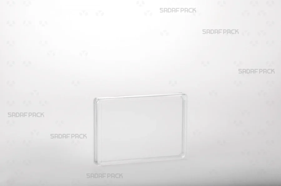 A three-quarter view of the 10.5 Crystal Rectangle container by Sadaf Pack, showcasing its transparent and elegant design for premium saffron packaging.