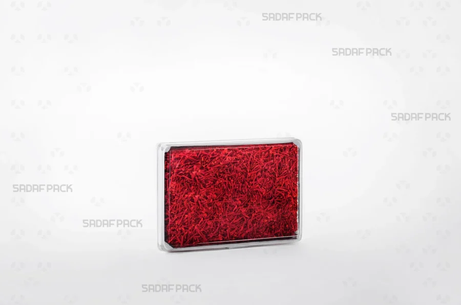 The rectangular 10.5 España container filled with saffron, demonstrating its suitability for high-value export products.