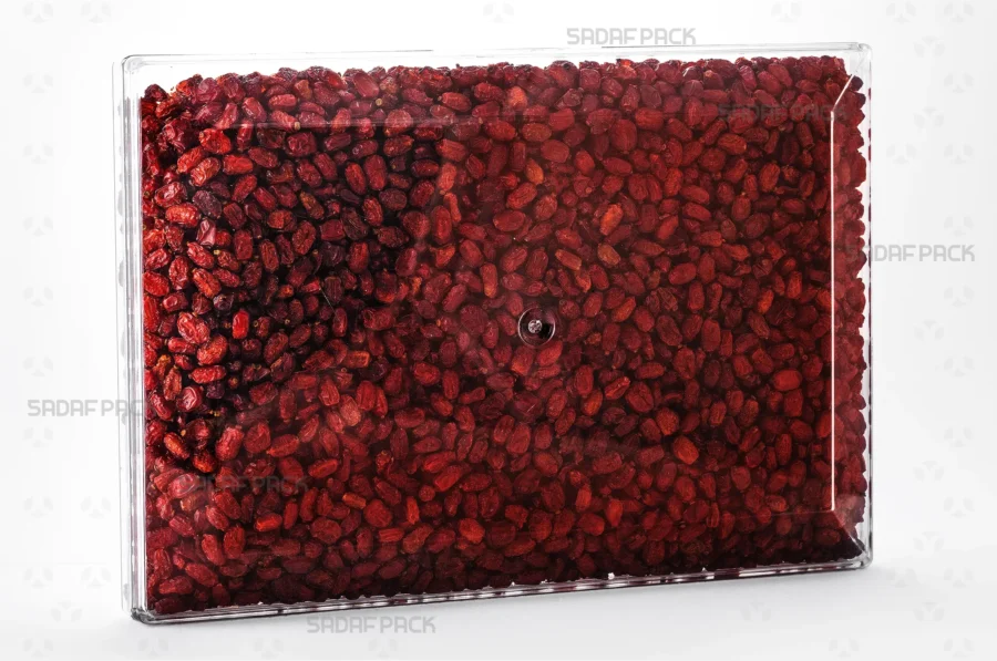 The elegant Rectangle 300 container filled with an assortment of Barberries, demonstrating its excellent product visibility and suitability for export gift packaging.