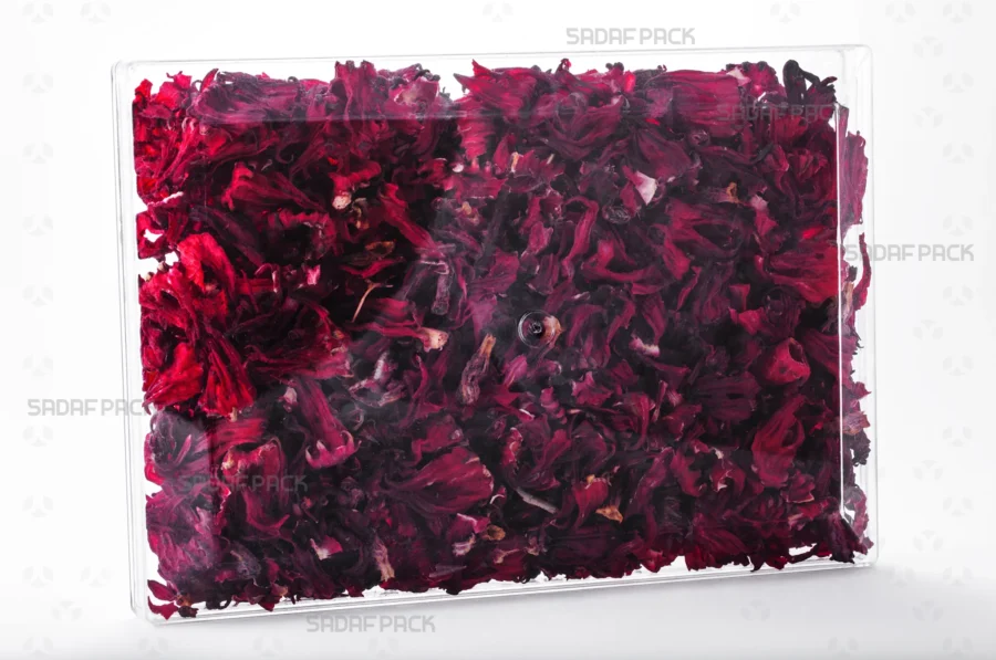 The elegant Rectangle 300 container filled with an assortment of Dried Hibiscus Petals, demonstrating its excellent product visibility and suitability for export gift packaging.