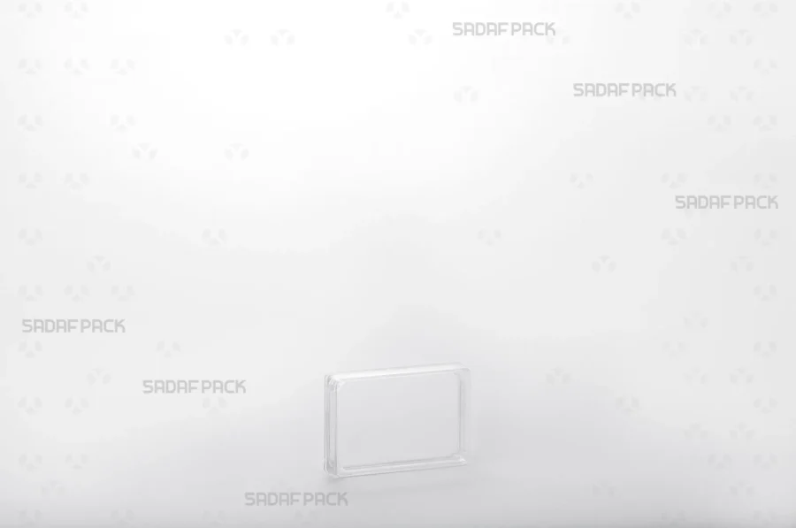 A three-quarter angle view of the 4 Crystal Rectangle container from Sadaf Pack, showcasing its clear, geometric design.