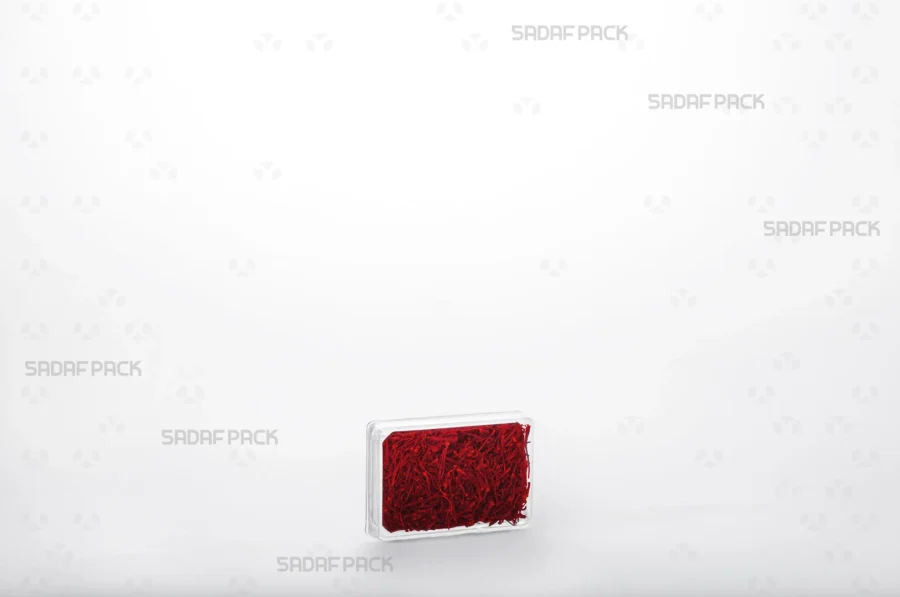 The 4 Crystal Rectangle container filled with premium Iranian saffron, demonstrating its ideal use for luxury export products.