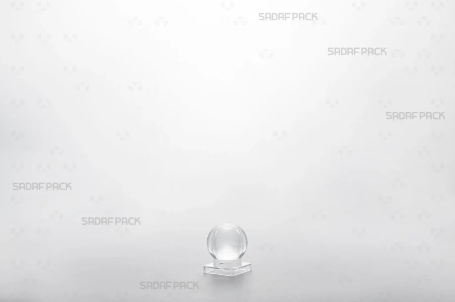 Close-up of the Sadaf 1 container's lid, showing its precise fit and clear poly-crystal design.