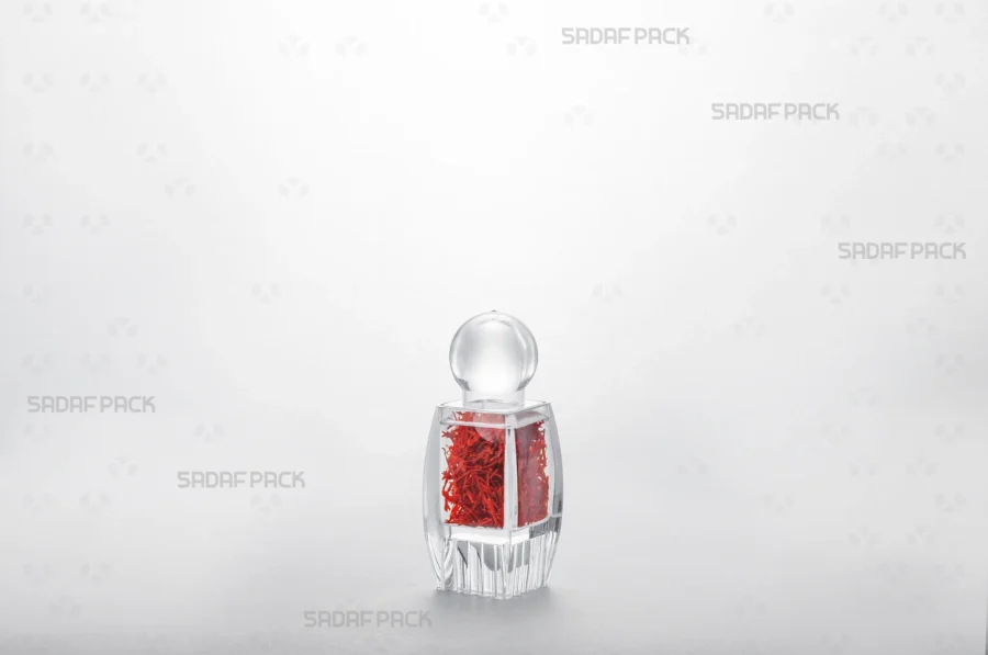 A view of the Sadaf 1 Raised Bottom container filled with saffron, showcasing its excellent clarity for export-quality products.
