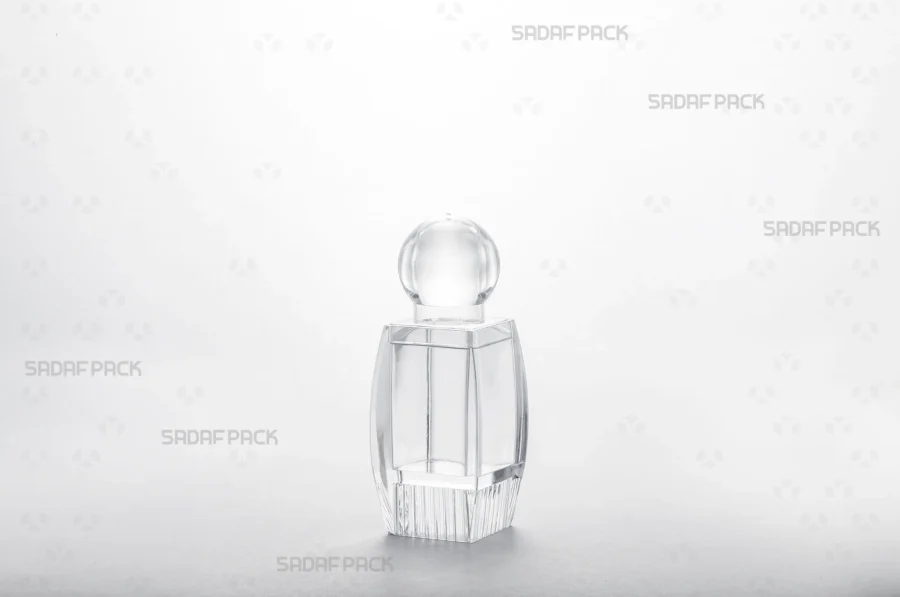A three-quarter view of the Sadaf 2 Raised Bottom Crystal Container by Sadaf Pack, showcasing its elegant design for premium products.