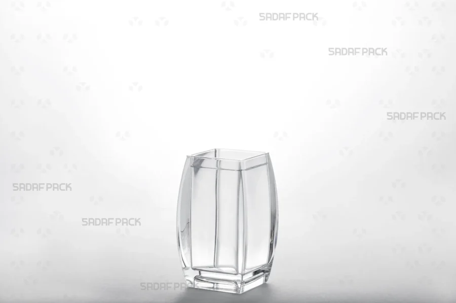Detailed three-quarter view of the Sadaf 3 container's body, emphasizing its seamless construction and transparent poly-crystal material.