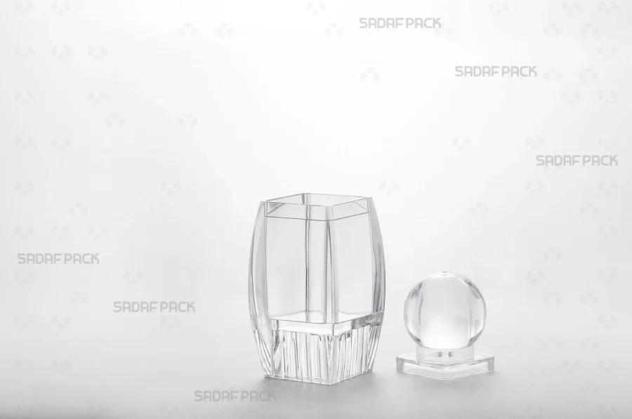The Sadaf 3 container shown with its lid and body separated side-by-side, revealing the interior space and raised bottom feature.