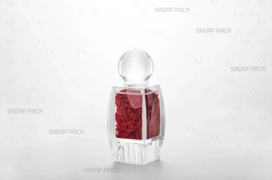 A Sadaf 3 Raised Bottom container filled with high-quality saffron, demonstrating its suitability for luxury export packaging.