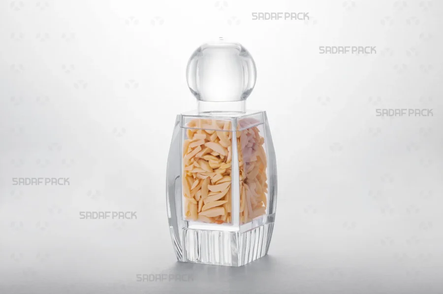 The Sadaf 4 Raised Bottom crystal container filled with Slivered Almonds, showcasing its suitability for premium export packaging.