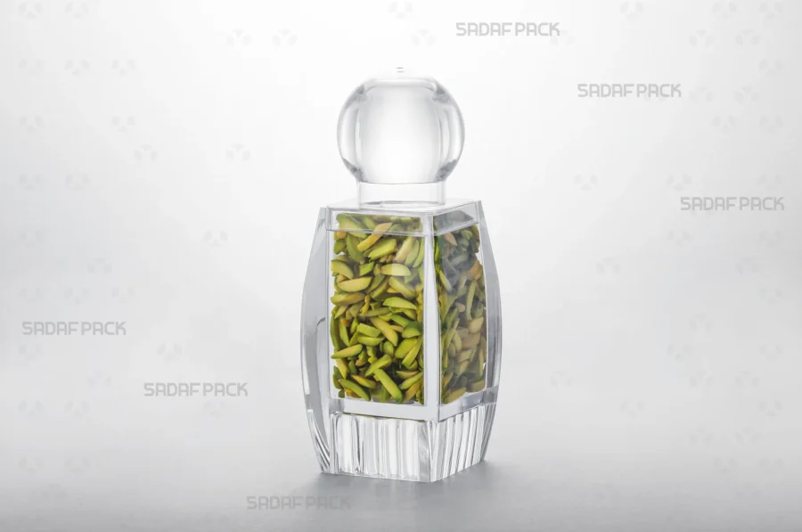 The Sadaf 4 Raised Bottom crystal container filled with Slivered Pistachios, showcasing its suitability for premium export packaging.
