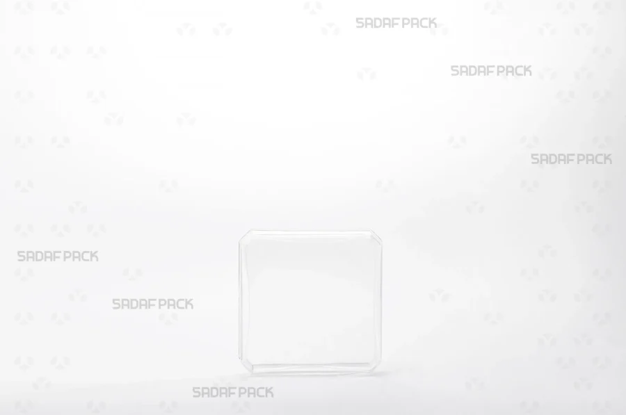 A direct front view of the 4 gram Square container, highlighting its sharp angles and transparent poly-crystal structure that provides a full view of the contents.