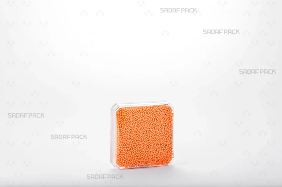 The 4 gram Square container filled with high-quality Nonpareils, demonstrating its capacity and suitability for the export of luxury goods.