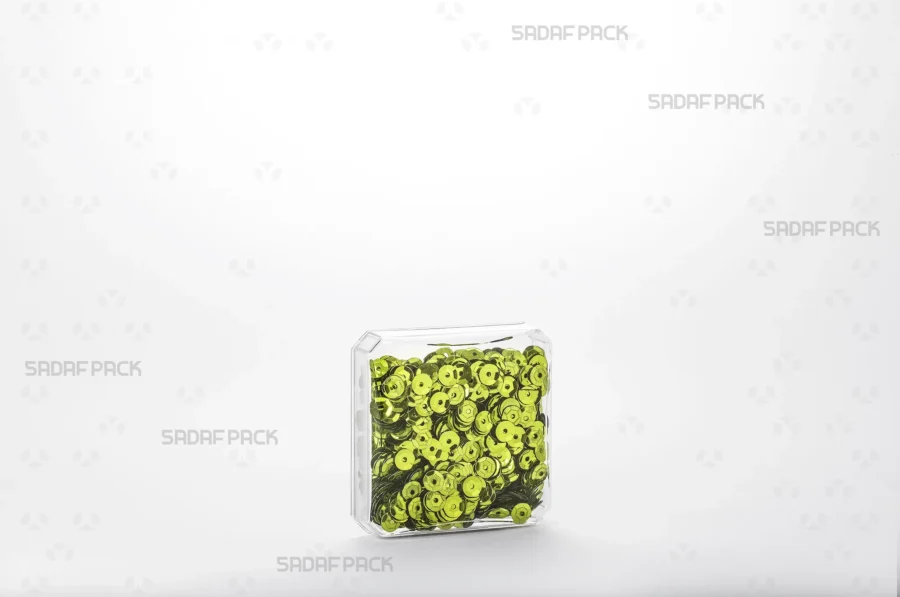 The 4 gram Square container filled with high-quality green Sequins, demonstrating its capacity and suitability for the export of luxury products.