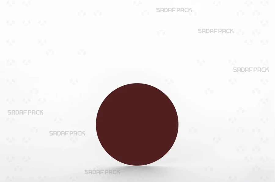 A size 11 circular crimson cardboard pad, designed to be placed inside saffron containers to elevate the contents and enhance the visual presentation.