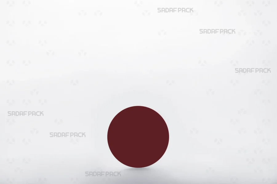 A size 6.5 circular crimson cardboard Pad, designed to be placed inside saffron containers to elevate the contents and enhance the visual presentation.