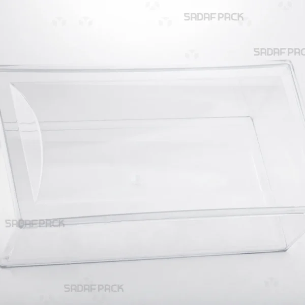 Three-quarter angle view of the Convex Rectangle Tall container by Sadaf Pack, showcasing its elongated and curved design.