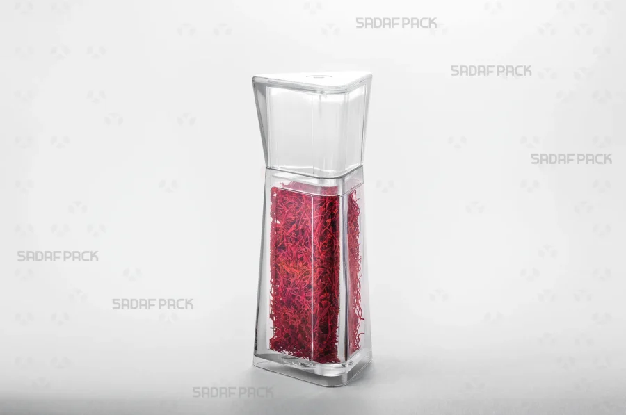 A three-quarter angle view of the Almas 3 container filled with high-quality saffron, making it ideal for export.