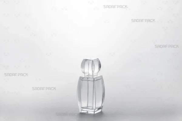 Three-quarter view of the Azin 1 crystal container by Sadaf Pack, showcasing its elegant design and crystal-clear transparency for premium saffron.