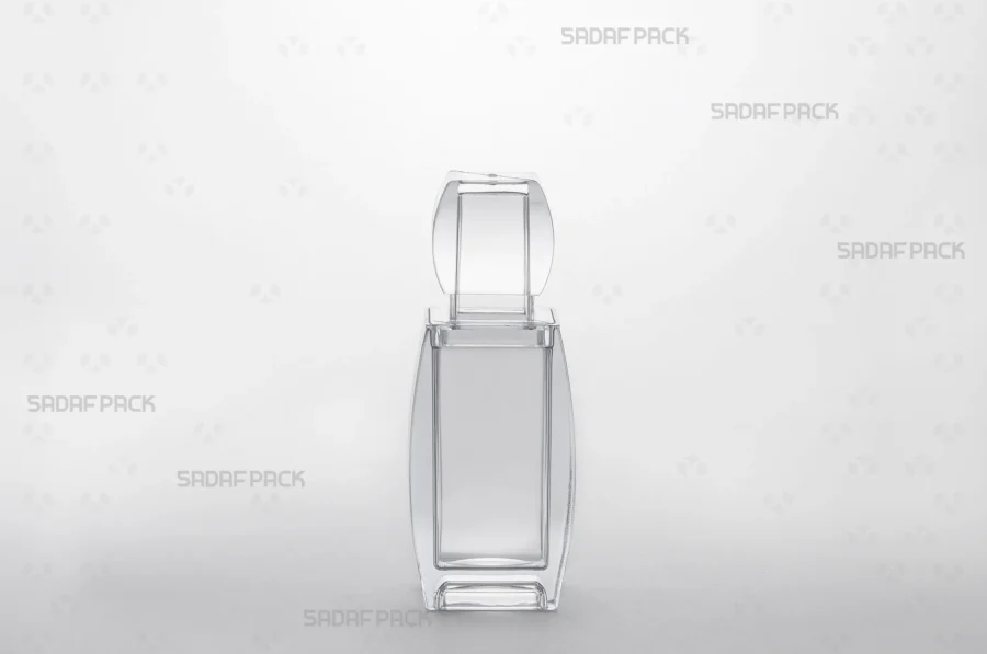 A direct front-angle view of the Azin 3 container, emphasizing its geometric shape and stable base. The crystalline clarity of the body beautifully displays the contents within.