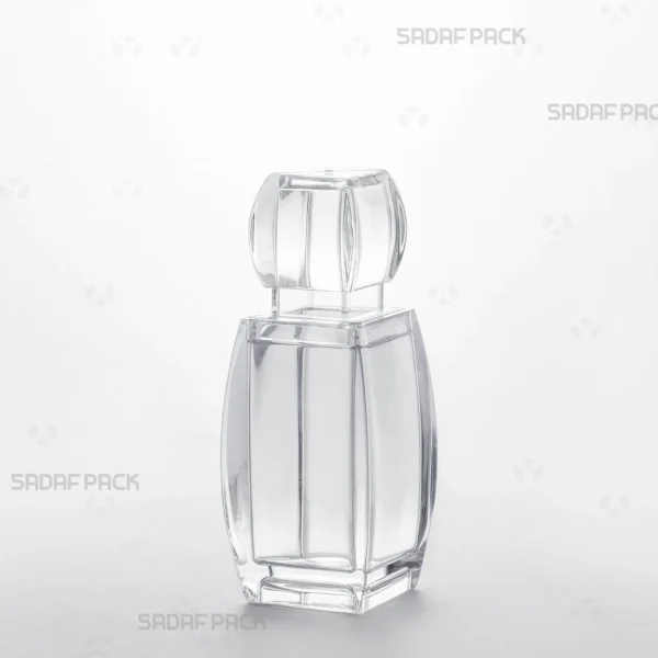 Three-quarter angle view of the elegant Azin 3 crystal container from Sadaf Pack, showcasing its clear, high-quality structure ideal for saffron packaging. This image highlights the container's sleek design and transparency.