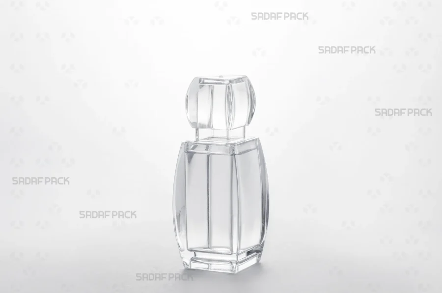 Three-quarter angle view of the elegant Azin 3 crystal container from Sadaf Pack, showcasing its clear, high-quality structure ideal for saffron packaging. This image highlights the container's sleek design and transparency.