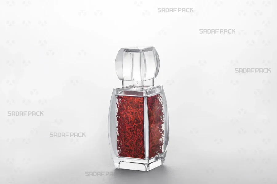 Three-quarter view of the Azin 3 container filled with saffron, demonstrating its capacity and suitability for premium export-quality food products.