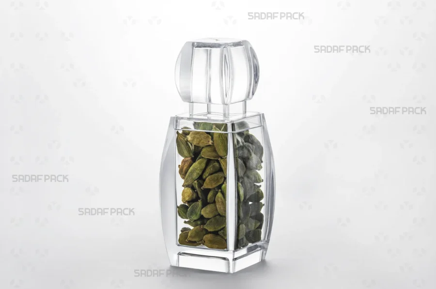 A three-quarter angle view of the Azin 4 container filled with high-quality cardamom, demonstrating its suitability for the export of luxury food products.