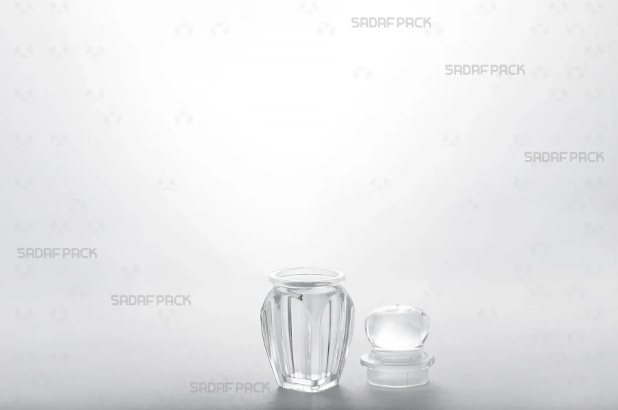 An overhead view showing the Gohar 1 container with its lid and body separated, revealing the clean and precise interior designed for saffron threads.