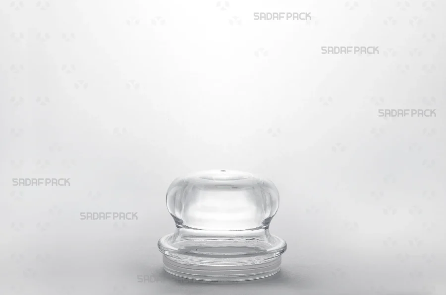 A close-up three-quarter view of the Gohar 5 container's lid, showing its precise fit and transparent polycrystal material.