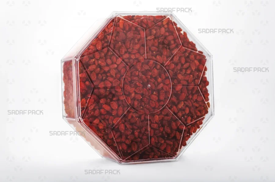 A three-quarter view of the Octagon Tall container filled with Barberries, demonstrating its excellent capacity and presentation for luxury export goods.