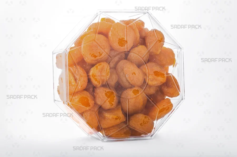 A three-quarter view of the Octagon Tall container filled with Dried Prunes, demonstrating its excellent capacity and presentation for luxury export goods.