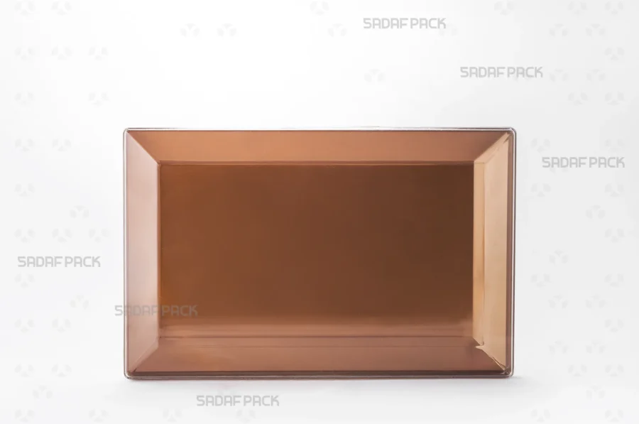 A front angle view of the Rectangle 200 Gold container, highlighting its clear polycrystal body and ornate gold-colored lid.