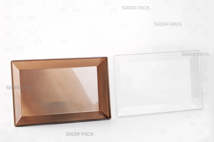 The Rectangle 200 Gold container with its lid placed beside the body, displaying the spacious interior suitable for sweets and nuts.