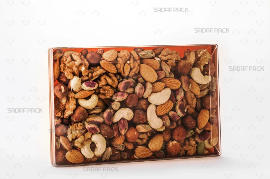 The luxurious Rectangle 200 Gold container filled with assorted nuts, ideal for premium gift packaging and export. 
