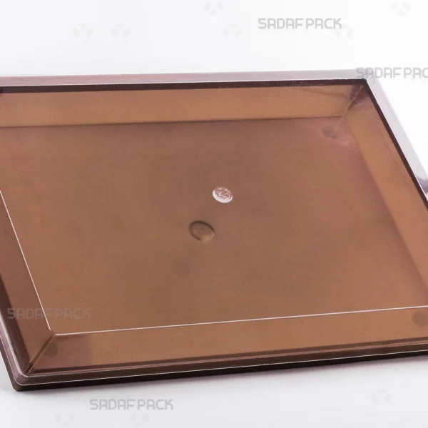 Three-quarter view of the 500 Rectangle Gold container by Sadaf Pack, showcasing its luxurious design for sweets and nuts.