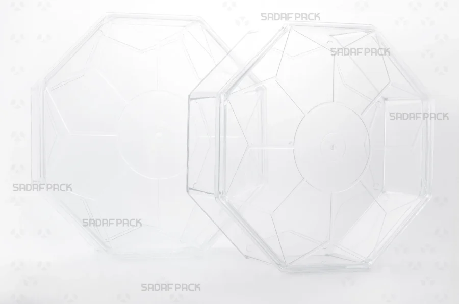 A collection of Sadaf Pack's octagonal containers, showcasing the short and tall models from the same series together.