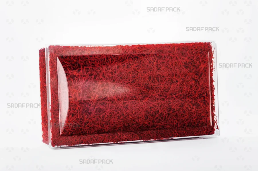 An elegant presentation of the Convex Rectangle Short Container filled with saffron, suitable for premium export packaging. 