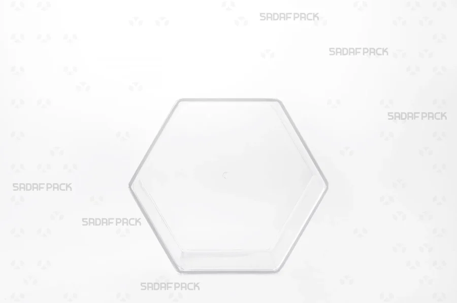 The front profile of the Hexagon Tall container, showcasing its elongated six-sided geometric structure and flawless clear polycrystal material.